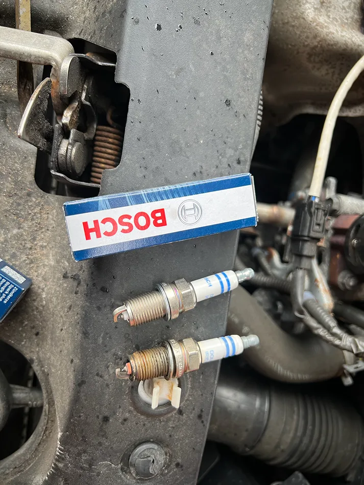 Spark plug replacement service